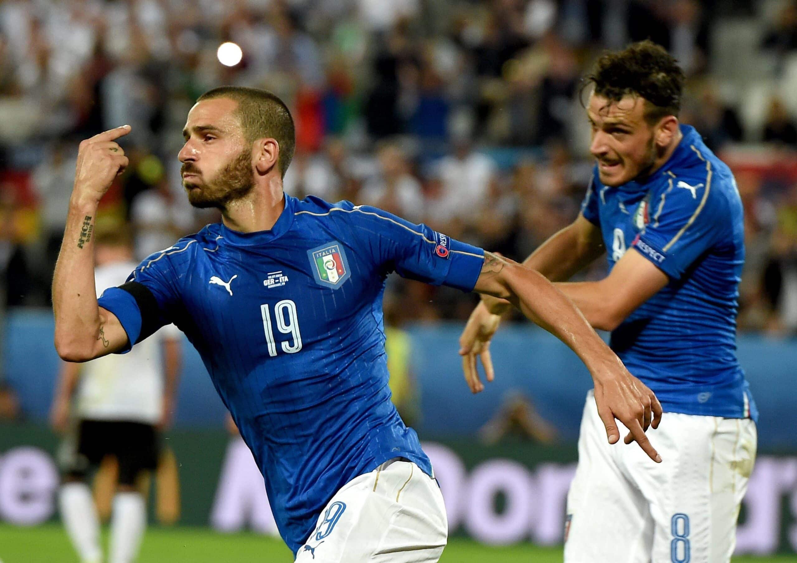 epa05404386 Leonardo Bonucci of Italy (L) celebrates scoring the 1-1 with Alessandro Florenzi of Italy during the UEFA EURO 2016 quarter final match between Germany and Italy at Stade de Bordeaux in Bordeaux, France, 02 July 2016. (RESTRICTIONS APPLY: For editorial news reporting purposes only. Not used for commercial or marketing purposes without prior written approval of UEFA. Images must appear as still images and must not emulate match action video footage. Photographs published in online publications (whether via the Internet or otherwise) shall have an interval of at least 20 seconds between the posting.) EPA/VASSIL DONEV EDITORIAL USE ONLY